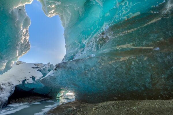 Inside an ice cave in Vatnajokull, Iceland. The ice is thousands of years old and so packed it is harder than steel and crystal clear.